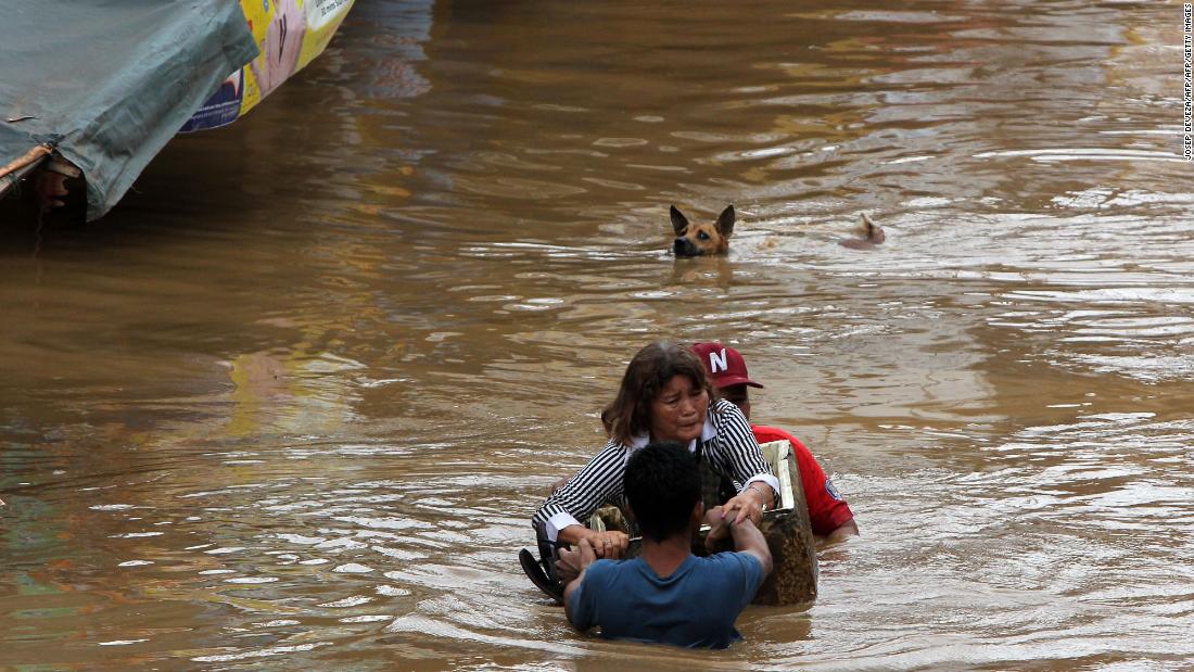 Tropical storm unleashes devastating floods and landslides in Philippines