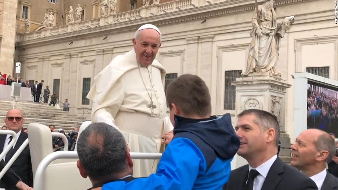 Watch boy who survived cancer get Pope's kiss