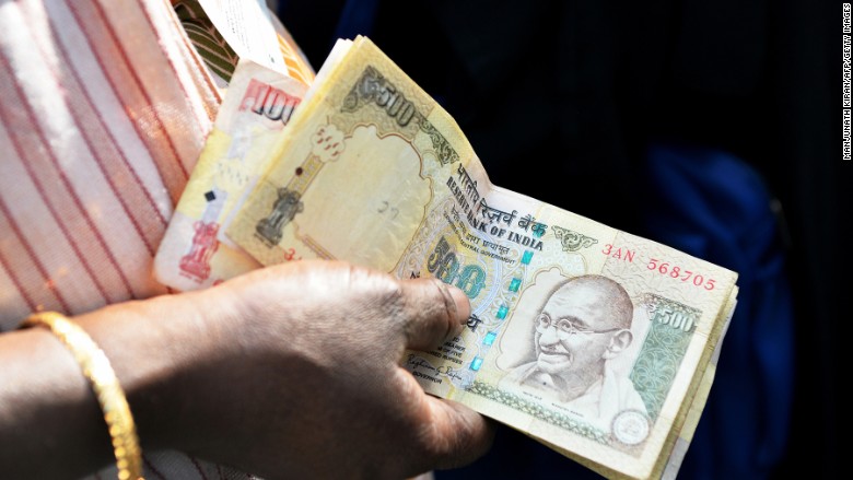 India's rupee hits record low as emerging markets struggle