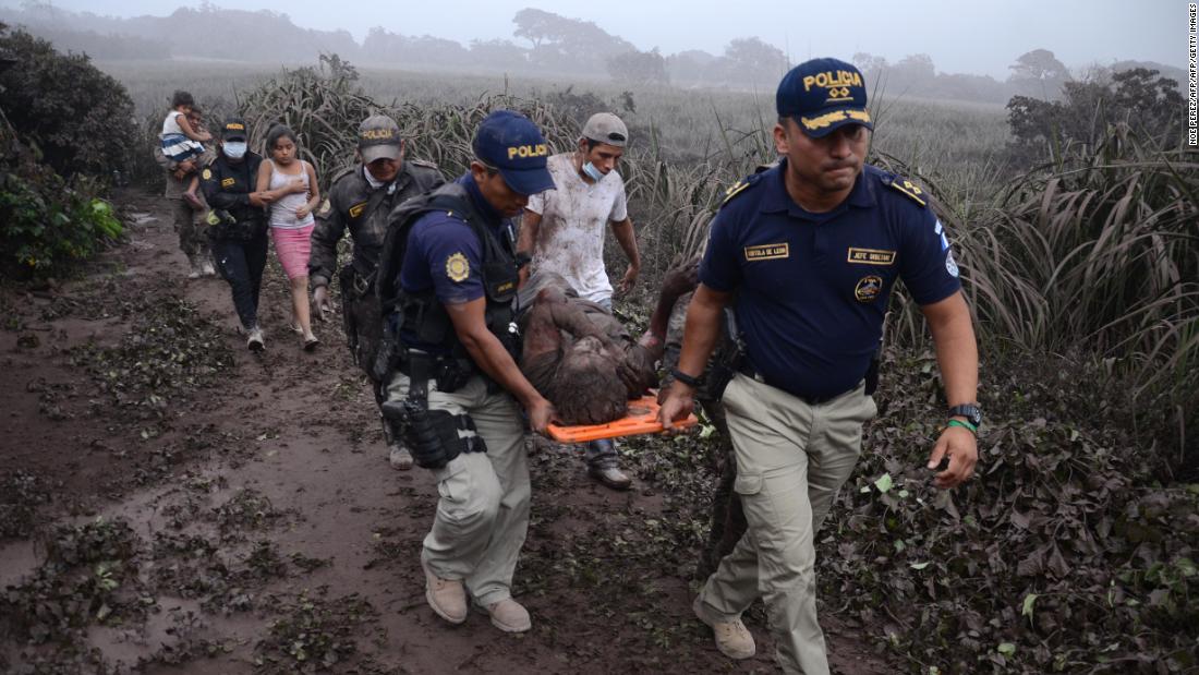 Guatemalans struggle to recover the dead buried by volcano eruption
