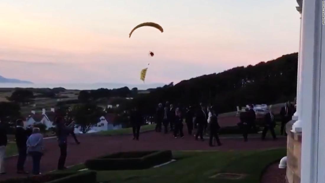 Protester paraglides over Trump, gets away