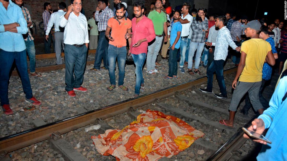 Train in India hits crowd celebrating Hindu festival